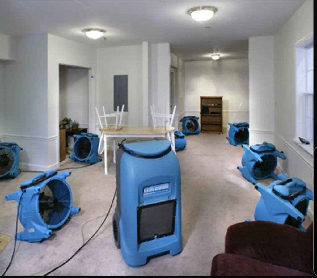 Air movers and dehumidifier setup for Water Damage Restoration in St. John